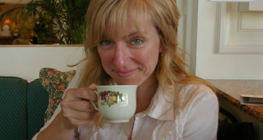 Gina Iliopoulos is the new host of GreenMark Pr's new on line news show. Here we see her enjoying a cup of tea at Disney's Grand Floridian Resort. The GreenMark Squiggle is in the upper right hand corner letting us know it is official.